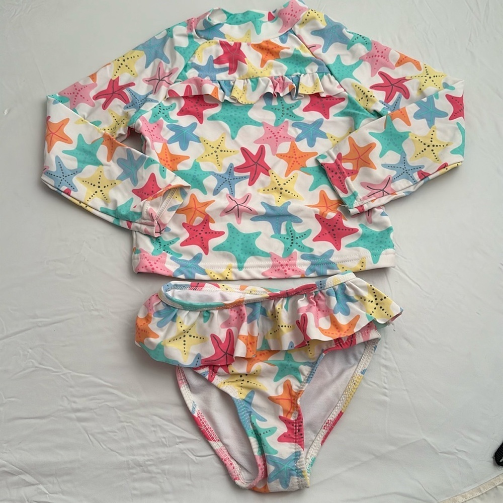 Little Me white multicolor starfish print rashguard and ruffle bottom